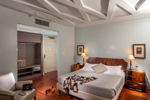 Hotel Alexandra tesisinde bir odada yatak veya yataklar