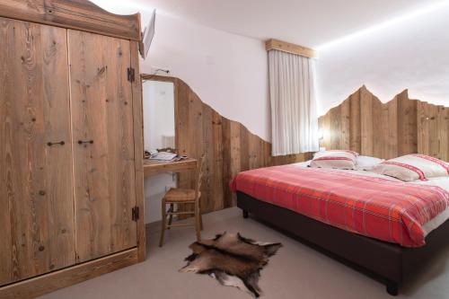 Postel nebo postele na pokoji v ubytování Hotel Pezzotti