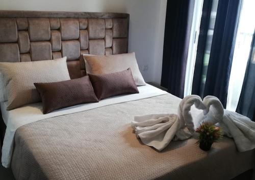 Ein Bett oder Betten in einem Zimmer der Unterkunft Appart Hotel Tanger Paname