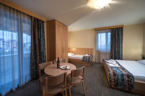 Postel nebo postele na pokoji v ubytování Hotel Malovec