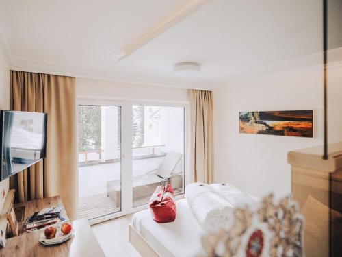 Letto o letti in una camera di Schlosshotel Seewirt