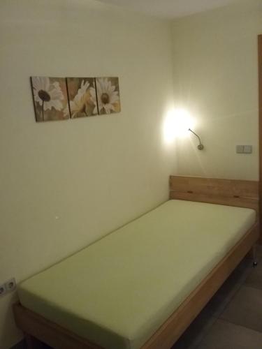 Katil atau katil-katil dalam bilik di Gästezimmer , Pension Wauri