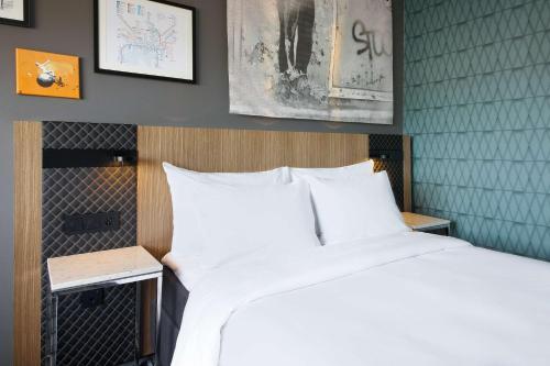 Letto o letti in una camera di Radisson Blu Scandinavia Hotel, Oslo