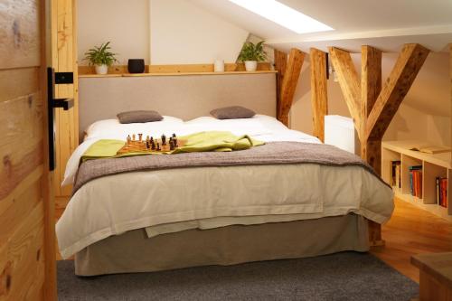 Giường trong phòng chung tại Kamienica Na Nowo Apartamenty