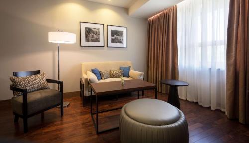  Radisson BLU Hotel Yerevan -  Room  picture :    Tea/Coffee maker    Minibar    Safety deposit box                            