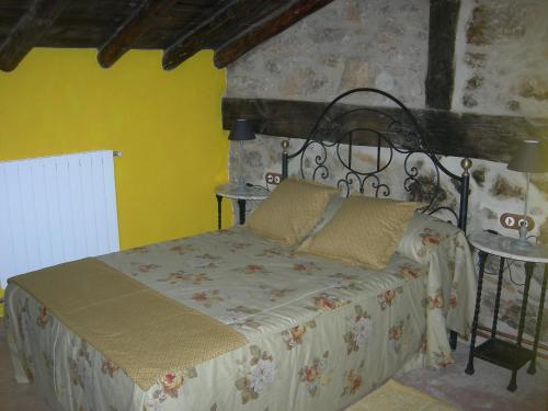 Tempat tidur dalam kamar di Las Leyendas del Jabal
