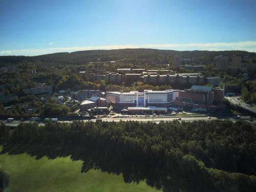 an aerial view of a building in a city at Radisson Blu Hotel Oslo Alna in Oslo