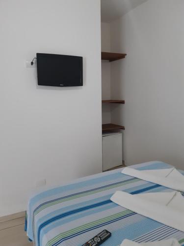 Cama o camas de una habitación en Pousada Raios de Luar