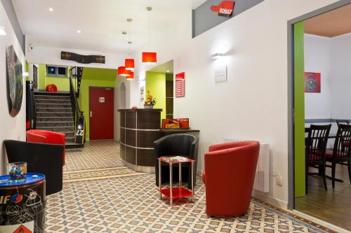 Posezení v ubytování Enzo Hotels Contrexeville