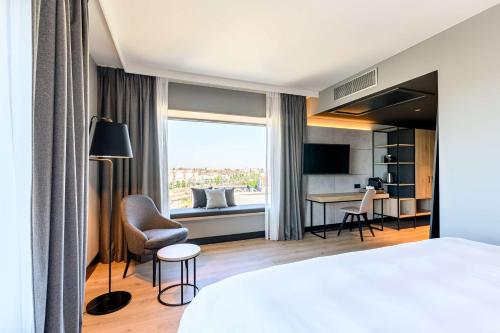 Säng eller sängar i ett rum på Radisson Hotel Antwerp Berchem