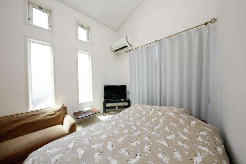 En eller flere senger på et rom på Etoile Soshigaya / Vacation STAY 62643