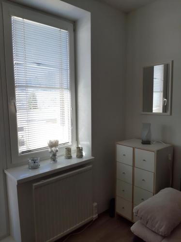 Ένα ή περισσότερα κρεβάτια σε δωμάτιο στο Apartmánový dom Magura