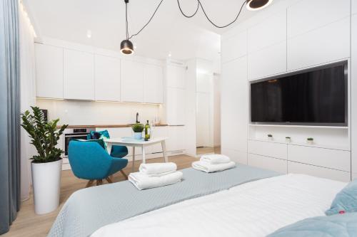 Ένα ή περισσότερα κρεβάτια σε δωμάτιο στο City of the Kings - Smile Apartment