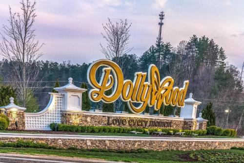 a sign for the disneyland resort at Pine Cone Ridge in Sevierville