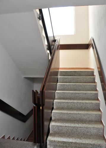 a set of stairs in a building with a window at Na Losenici in Nicov