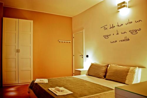 Ένα ή περισσότερα κρεβάτια σε δωμάτιο στο Bed And Breakfast Charming House