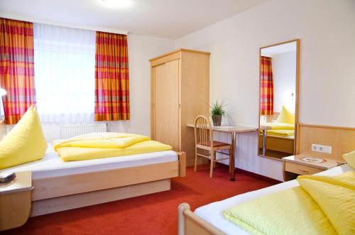 Ένα ή περισσότερα κρεβάτια σε δωμάτιο στο Apart Simone