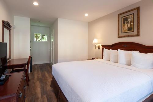 Katil atau katil-katil dalam bilik di Studio City Court Yard Hotel