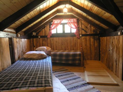 Postelja oz. postelje v sobi nastanitve Holz Haus Banja Luka