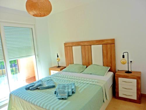 Casa Colin - Mar Menor Golf Resort tesisinde bir odada yatak veya yataklar