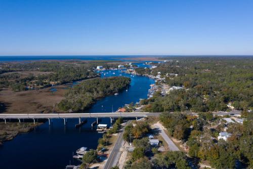 an aerial view of a bridge over a river at Steinhatchee River Inn and Marina in Steinhatchee