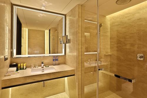 a bathroom with a sink and a shower at Hyatt Place Shenzhen Dongmen in Shenzhen