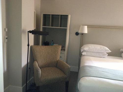 Ένα ή περισσότερα κρεβάτια σε δωμάτιο στο Hotel Parq Central Albuquerque