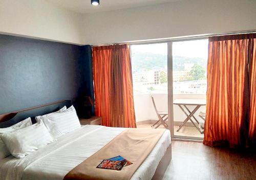 Postel nebo postele na pokoji v ubytování Studio Sea View Patong