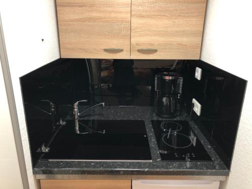 Φωτογραφία από το άλμπουμ του Ferienwohnung Apartment Dettum mit eigenem Bad, Kochnische und Wintergarten σε Dettum