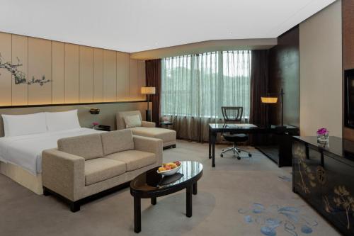 Coin salon dans l'établissement Chongqing Ronghui Grand Hotel