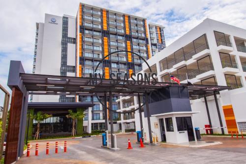 a large building with a sign on it at Timurbay by My Seasons in Kuantan