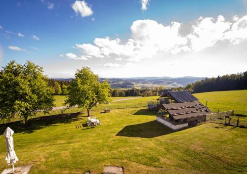 an overhead view of a large field with a building at Landhotel Haagerhof in Aigen im Mühlkreis