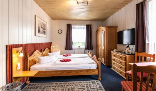 Postel nebo postele na pokoji v ubytování Esprit Hotel