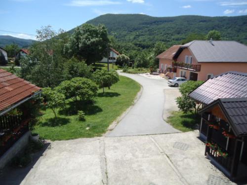 an overhead view of a road in a village with houses at House Ilija Hodak in Seliste Dreznicko