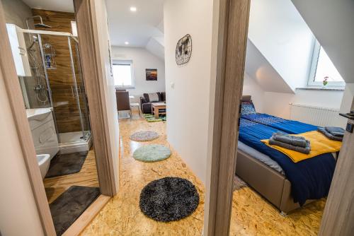 Postel nebo postele na pokoji v ubytování Apartment A1