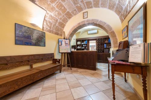 TV a/nebo společenská místnost v ubytování San Francesco Heritage Hotel