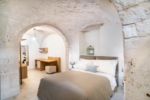 Ένα ή περισσότερα κρεβάτια σε δωμάτιο στο Petrantiche - Albergo Diffuso