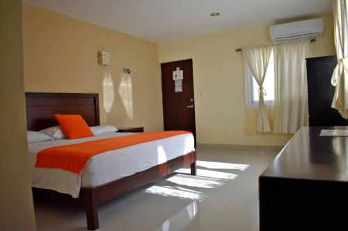 Cama o camas de una habitación en Hotel Casa Rosario