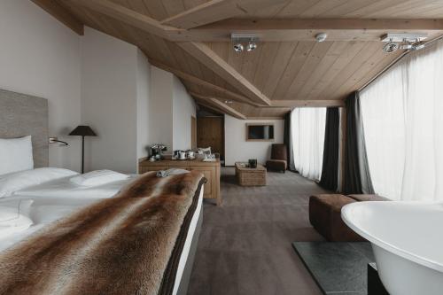 Postel nebo postele na pokoji v ubytování Eco & Wellness Boutique Hotel Sonne