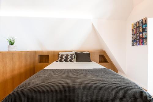 Letto o letti in una camera di Vista Lisboa Guest Apartments