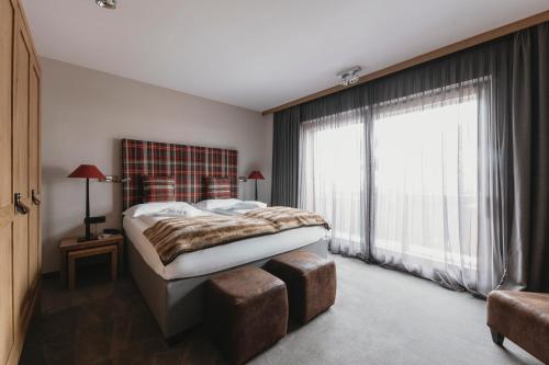 Postel nebo postele na pokoji v ubytování Eco & Wellness Boutique Hotel Sonne