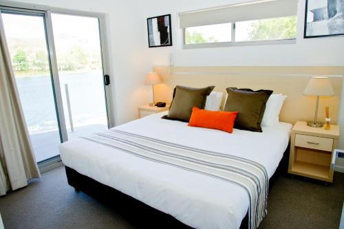 Llit o llits en una habitació de Jacana Apartments