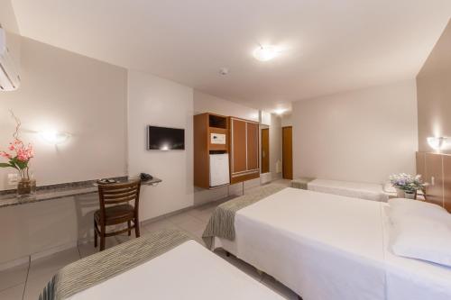 Postel nebo postele na pokoji v ubytování Hotel GAPH Maringa - Economico Mini Resort