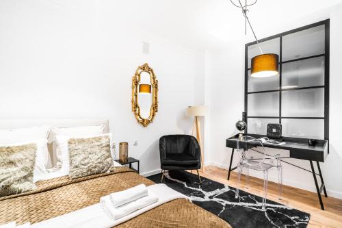 Televízia a/alebo spoločenská miestnosť v ubytovaní Main Square Apartments - LoftAffair