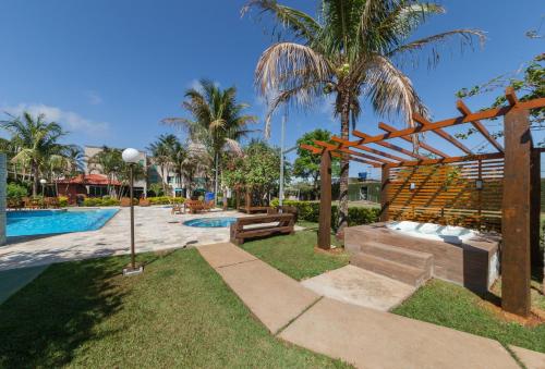 בריכת השחייה שנמצאת ב-Hotel GAPH Maringa - Economico Mini Resort או באזור