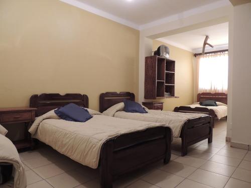 Refugio del Turista tesisinde bir odada yatak veya yataklar