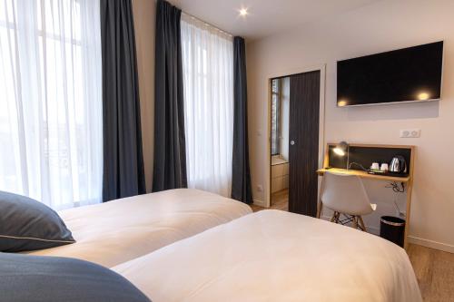 Mayrena Hotel Restaurantにあるベッド