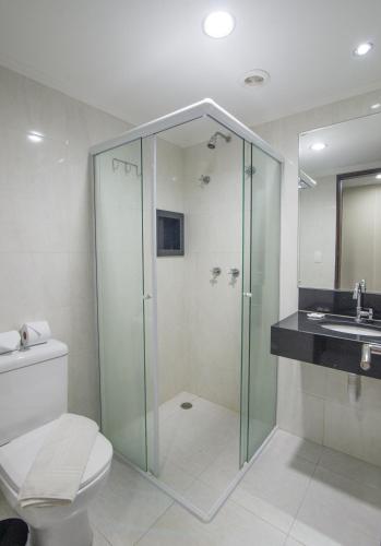 Um banheiro em Hotel Guarumar
