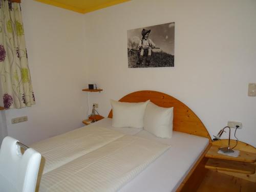 Posteľ alebo postele v izbe v ubytovaní Hof am Platzli