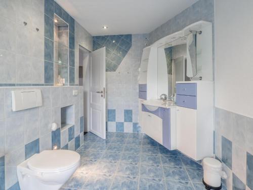 Ένα μπάνιο στο Ferienhaus Winde 8